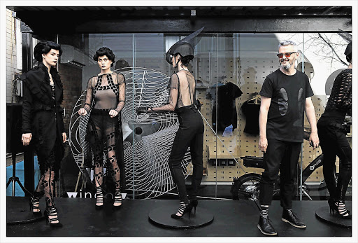 ON TRACK: Models wearing designs by Jacques van der Watt of Black Coffee, at a public viewing outside the Cycology store at 44Stanley Avenue in Johannesburg