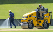 Pitch preparations underway during the South African national men's cricket team training session and press conference at SuperSport Park on January 12, 2018 in Pretoria, South Africa. 