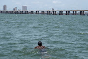 Akinrodoye Samuel while swimming the 11.8km stretch of the Third Mainland Bridge, advocating for the theme 'Swim Against Suicide And Depression' in Lagos, Nigeria, on March 30 2024.