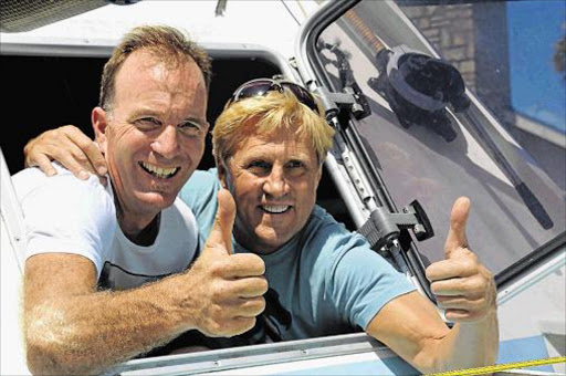 ROWING TO RIO: East London’s Peter van Kets and fellow adventurer Braam Malherbe inspected their new boat in PE yesterday. The daredevil duo plan to row across the Atlantic Ocean in the Cape to Rio yacht race in January 2017