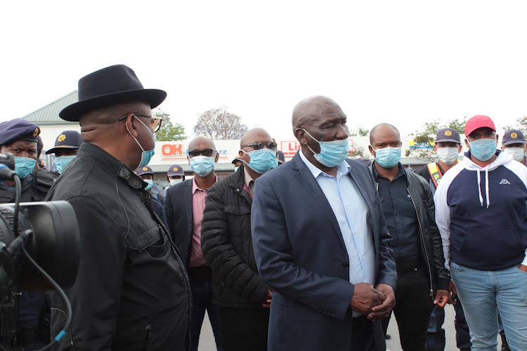 Police minister Bheki Cele urged shoppers to observe the required distance in the queues on Saturday.