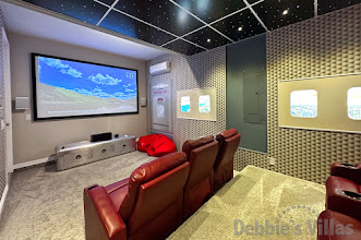 Movie fans can enjoy the aeroplane-themed home cinema room at this Kissimmee vacation villa