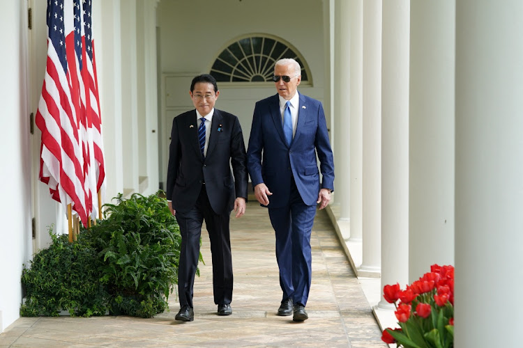 US President Joe Biden and Japanese Prime Minister Fumio Kishida walk along the White House Colonnade toward the Oval Office for a meeting at the White House in Washington, DC, the US, April 10 2024. Picture: REUTERS/Kevin Lamarque/Pool