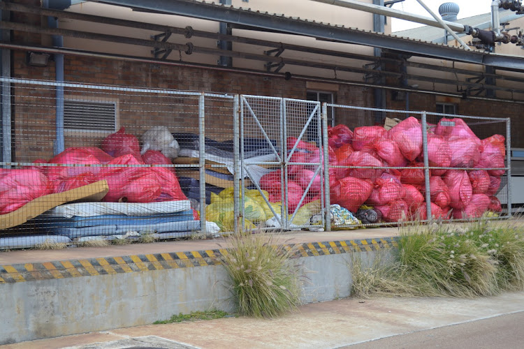 Dirty laundry stacked at Livingstone Hospital in the Eastern Cape.