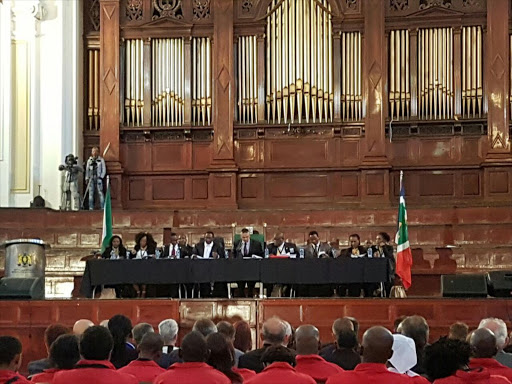 EFF members in red overalls allowed to sit in as dress code suspended for the City of Johannesburg council meeting. Picture Credit: @Our_DA on Twitter