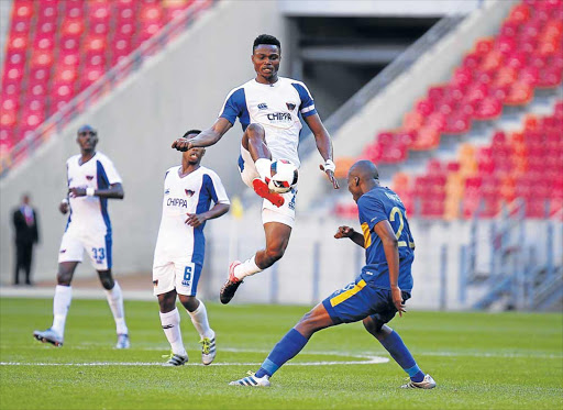 IN POSSESSION: Chippa United’s James Okwuosa, centre, keeps the ball on his boot mid-air during the Premiership match between Chippa United and Cape Town City FC at the Nelson Mandela Bay Stadium in Port Elizabeth on Saturday. Chippa lost the game 2-1 GALLO IMAGES