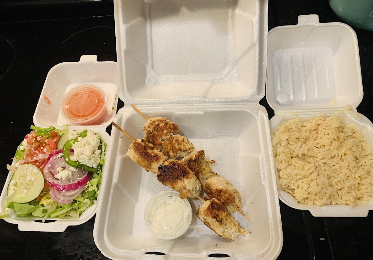 Chicken souvlaki, rice, Greek salad and tzatziki sauce