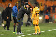 Kaizer Chiefs Italian coach Giovanni Solinas speaks to winger Kabelo Mahlasela during the MTN8 3-0 quarterfinal win over Free State Stars at FNB Stadium on August 11, 2018 in Johannesburg, South Africa.