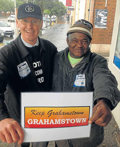 STILL GOOD FRIENDS: Independent candidate Jock McConnachie, left, and Sigidla Ndumo of the EFF say even though they are fighting it out in the same ward for two completely different political ideologies they agree changing Grahamstown’s name is not a priority Picture: DAVID MACGREGOR