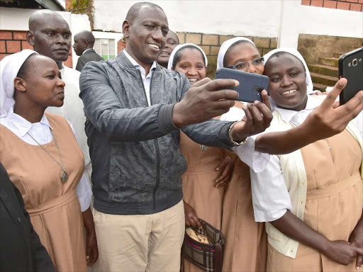 Deputy President William Ruto takes a selfie with Catholic sisters on Saturday, November 10, 2018. /DPPS