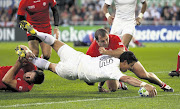 Shontayne Hape scores a try for England at Otago stadium in Dunedin during an ill-disciplined display by the former champions against lowly Georgia in pool B of the Rugby World Cup. Manager Martin Johnson was fuming after England conceded 14 penalties Picture: MARCOS BRINDICCI/GALLO IMAGES