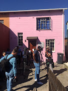 Journalists gather in front of the Pieters' home ahead of President Jacob Zuma's visit.