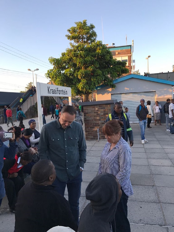 File picture of Janine Myburgh, president of the Cape Chamber of Commerce and Industry and Cape Town mayoral committee member for transport, Brett Herron, at the Kraaifontein train station.