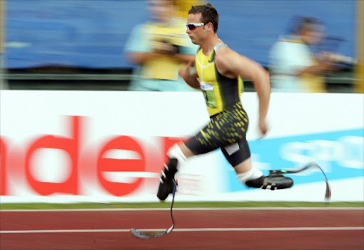 South Africa's Oscar Pistorius competes in the men's 400m race B during the Athletics IAAF Golden Gala in Rome's Olympic Stadium 13 July 2007. South African sprinter, who runs with carbon fiber artificial limbs, will face able-bodied athletes. Pistorius placed second. The 21-year-old from Pretoria has set competitive times in the 100 metres, 200 metres and 400 metres although he had both legs amputated below the knee when less than a year old because of a congenital condition.