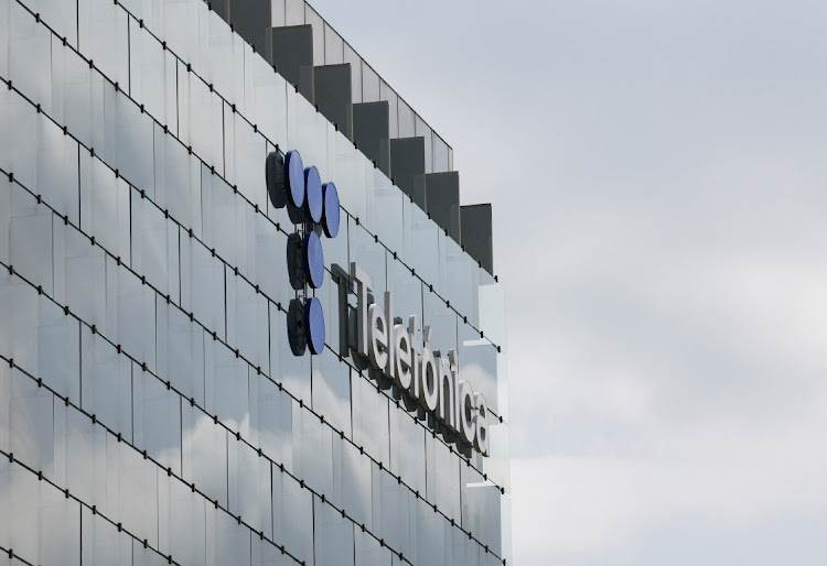 The logo of Spanish Telecom company is displayed atop the company's building in Madrid, Spain. Picture: VIOLETA SANTOS MOURA/REUTERS