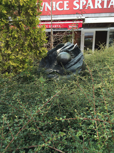 Statue in the Bushes