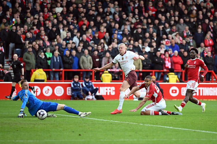 Erling Haaland scores Manchester City's second goal past Matz Sels of Nottingham Forest in their Premier League win against Nottingham Forest at the City Ground in Nottingham on Sunday.