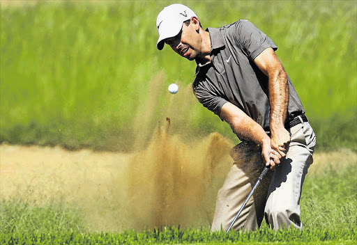 Charl Schwartzel gets his 2012 Nedbank Golf Challenge campaign off to a dusty start at Sun City yesterday, where two rookies - Bill Haas and Nicolas Colsaerts - took a one-shot first-round lead