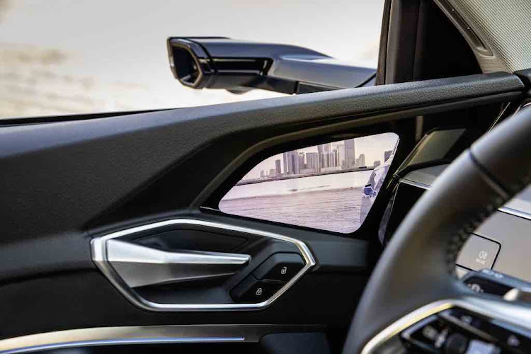 Cameras replace the wing mirrors, sending a live image to screens in the top of the doors