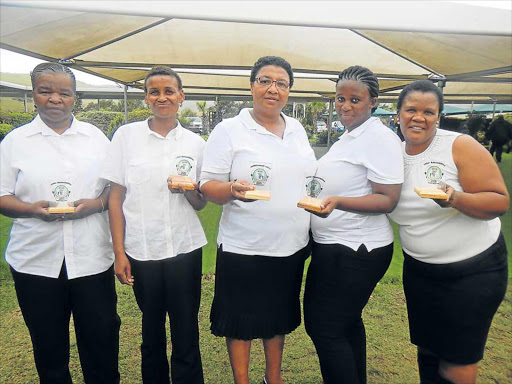 UNTOUCHABLE: King Sabata Dalindyebo Darts Association’s women team, from left, Ncediwe Ngxola, Nomxolisi Ngesi,Thembela Ndawo, Noluthando Numa and Vuyokazi Tyiso, won the women’s section during the Eastern Cape provincial inter-association tournament