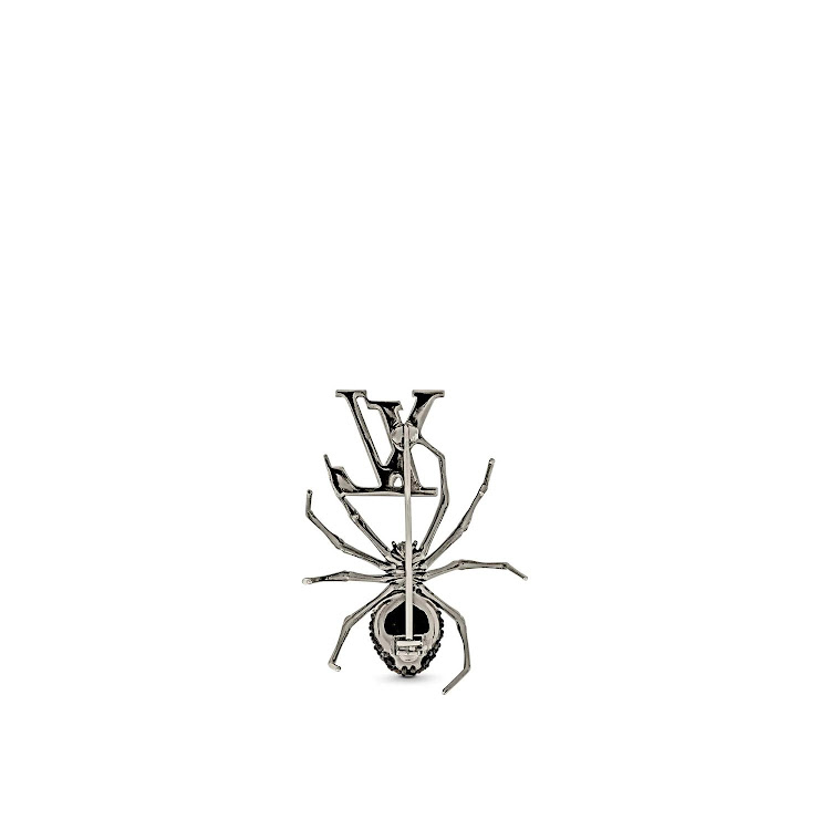 Louis Vuitton Spider brooch.