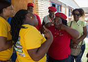 ANC and EFF supporters face off in Marikana West, where President Jacob Zuma was expected to hand over houses to beneficiaries. The president, however, did not show up