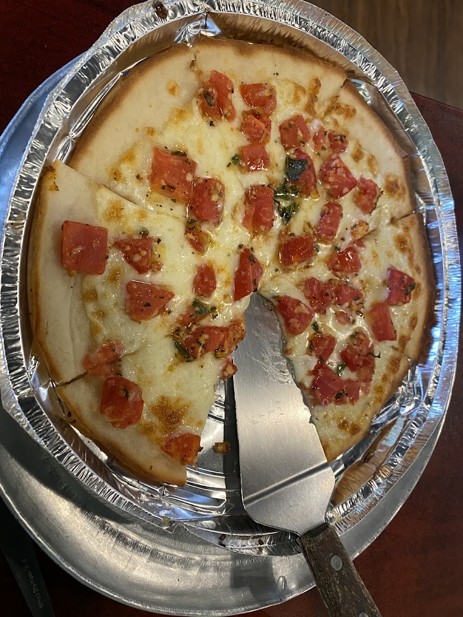 Margherita pizza in foil tray