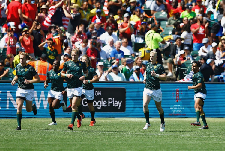 Philip Snyman of South Africa (3rd L) leads out the players during the Men's match between South Africa and Scotland on day 2 of the Rugby World Cup Sevens 2018 at AT&T Park on July 21, 2018 in San Francisco, United States of America.