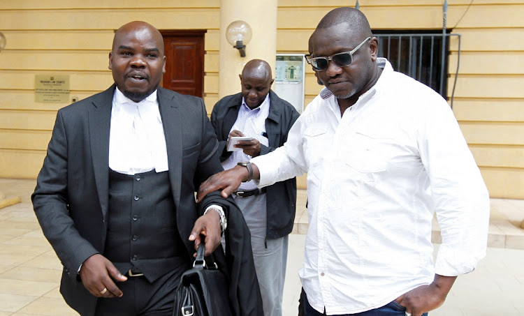 Lawyers Charles Midenga and Ekuru Aukot leave the court after Kenya high court judge Chacha Mwita ruled the government's intention to deploy police officers to lead a UN-approved mission to Haiti was unconstitutional. Picture: MONICAH MWANGI/REUTERS