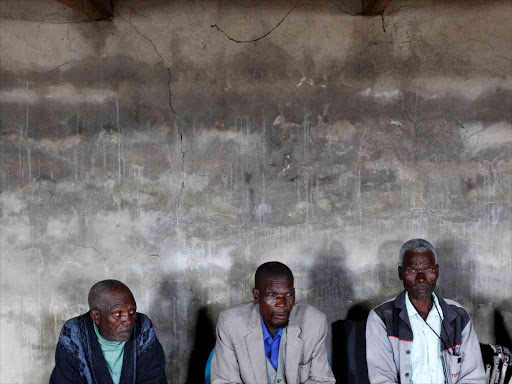 Former gold miners listen to speakers at a registration meeting for miners with silicosis in Bizana in South Africa's impoverished Eastern Cape province, March 7, 2012. Photo/REUTERS