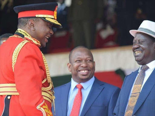 President Uhuru Kenyatta, Governor Mike Sonko and AU Envoy Raila Odinga at Nyayo National Stadium during Jamhuri Day celebrations, December 12, 2018. /PSCU