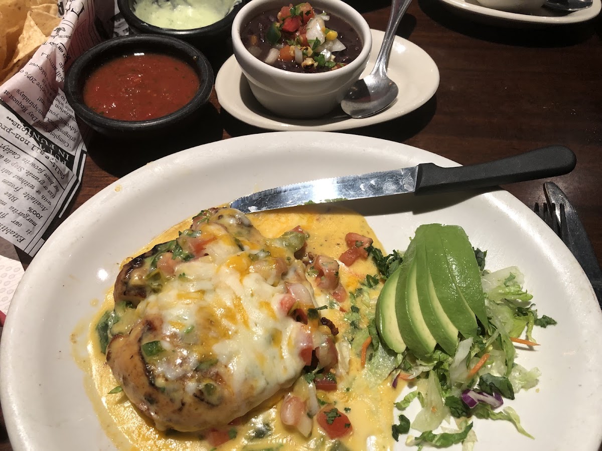 pollo con queso. ask for black beans and corn tortilla. the mexican rice is not safe