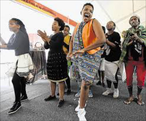 A group from Steve Biko Arts Centre in Ginsberg performing at the marquee on the Esplanade for the Legends Marathon Picture: MARK ANDREWS