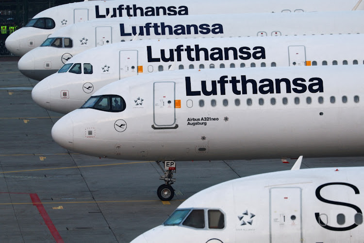 Lufthansa jets parked at an airport in Frankfurt, Germany, March 7 2024. Picture: REUTERS/ Kai Pfaffenbach