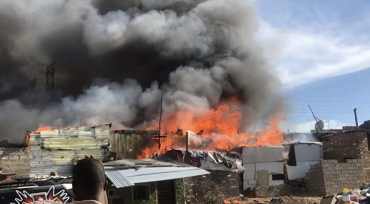 A fire that swept through Alexandra township destroyed more than 600 homes on Thursday afternoon.