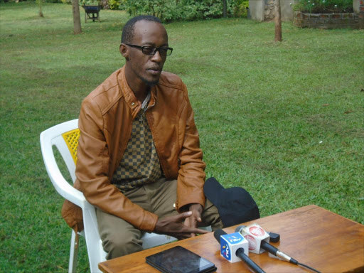 Bungoma politician and economist Steve Biko speaks to the media in Bungoma town /JOHN NALIANYA