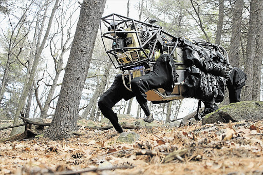 FOUR-LEGGED WARRIOR: A Google-owned robot named 'Big Dog' is on trial with the US military. The Legged Squad Support System relieves troops of their heavy equipment, takes voice commands and avoids obstacles