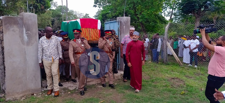 The body of Brigadier Said carried by pallbearers arrives at his home in Kikambala, Kilifi County for burial on Friday, April 19, 2024.