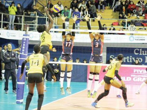Malkia Strikers’ Mercy Moim, Everlyn Makuto and Brackcides Agala in action against Dominican Republic during the 2016 FIVB Grand Prix. /COURTESY