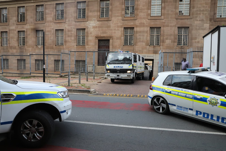 The ten suspects who have been arrested for the Rosettenville shooting leave the Johannesburg Magistrates Court.