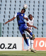 Mogakolodi Ngele of Tshakhuma FC challenged by Thabo Matlaba of Swallows FC during the DStv Premiership match between Swallows FC and Tshakhuma FC at Dobsonville Stadium on March 07, 2021 in Johannesburg, South Africa. 