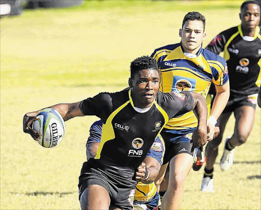 ONE-HAND PUSH: Sibongile Novuka of Fort Hare runs with the ball during the match between UWC and Fort Hare at the University Sport South Africa Rugby Week Picture: STEPHANIE LLOYD