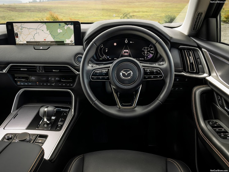 The luxurious cabin adopts Mazda’s minimalist feel.