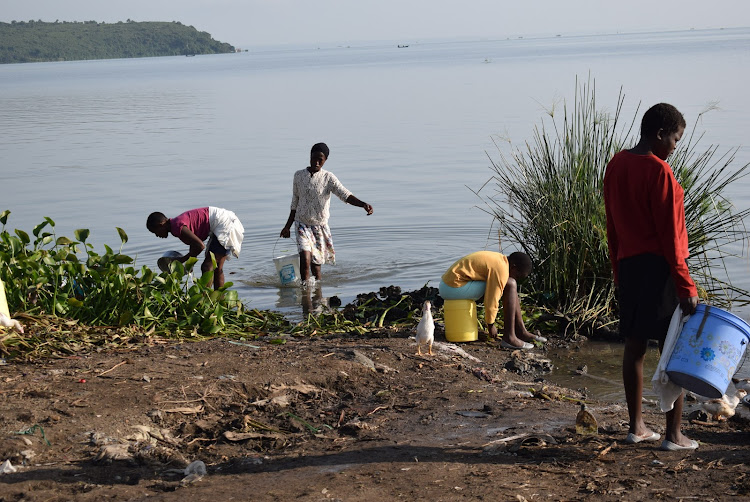 Residents of Homa Bay town draw untreated water from Lake Victoria at pier in Homa Bay town on May1, 2022