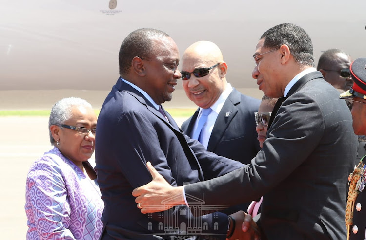 President Uhuru Kenyatta was on Monday received by Prime Minister Andrew Holness and Governor General Patrick Allen of Jamaica in Kingston.