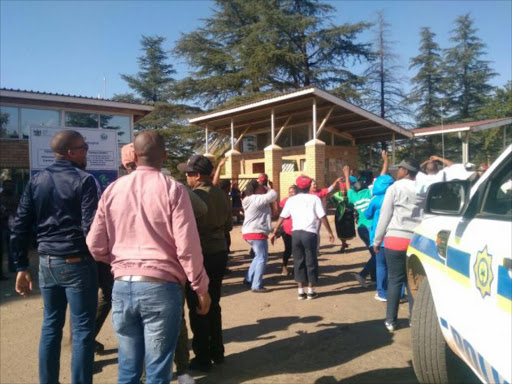 Protestors blocking some patients and all medical staff access to Tshepong hospital Picture: Katharine Child