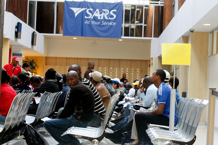 File photo of taxpayers waiting to be assisted with their income tax returns at the Sars office in Port Elizabeth.