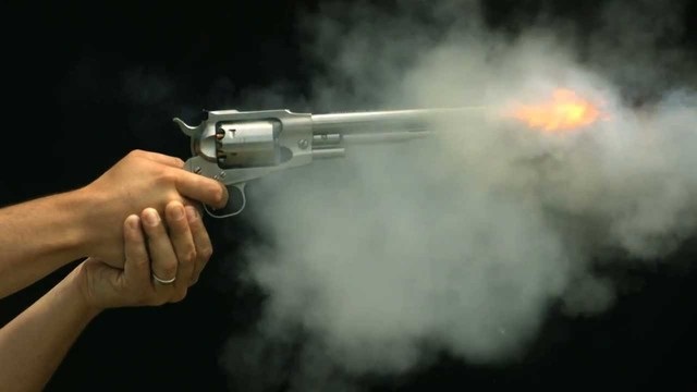 Stock image of a gun being fired.