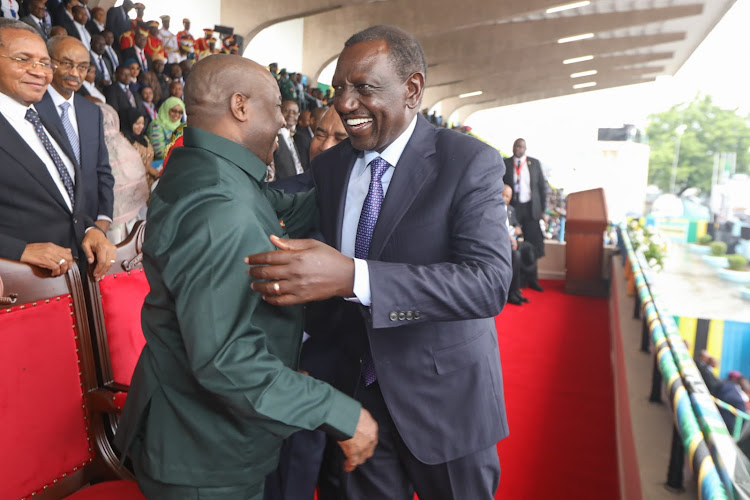 President William Ruto with his Burundi counterpart Évariste Ndayishimiye at the 60th anniversary of the union between the former Republic of Tanganyika and the People’s Republic of Zanzibar, in Dar es Salaam, Tanzania on April 26, 2024.