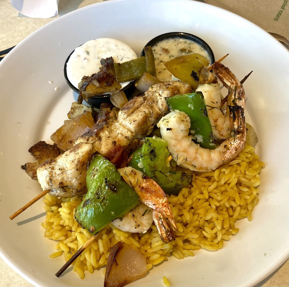 Chicken and shrimp kabob with rice and grilled potato salad.